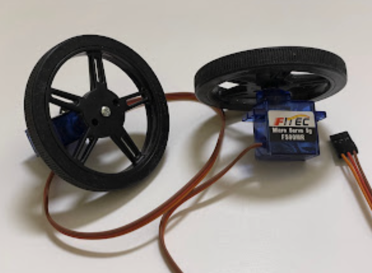 Attach wheels to servo